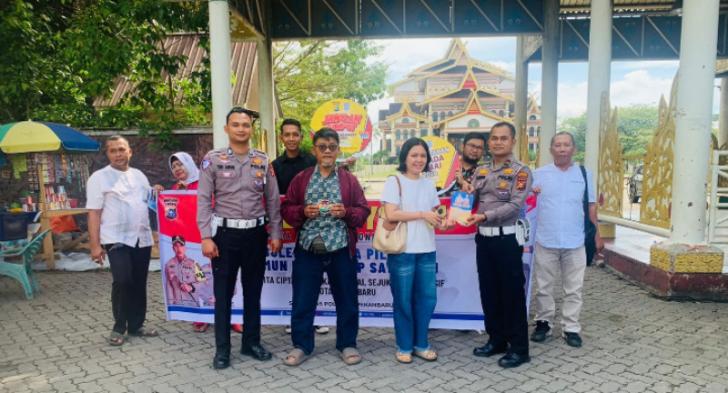 Satlantas Polresta Pekanbaru Sosialisasi Keselamatan di Lapangan Purna MTQ, Ada Pesan Pilkada Damai