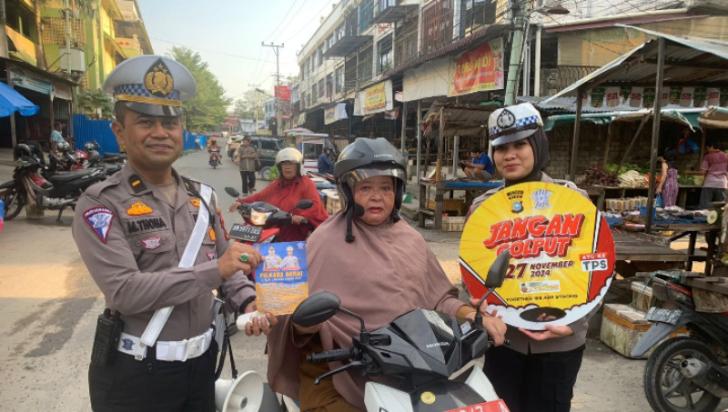 Begini Aksi Polantas di Pasar Bawah, Berikan Dukungan untuk Pilkada Damai