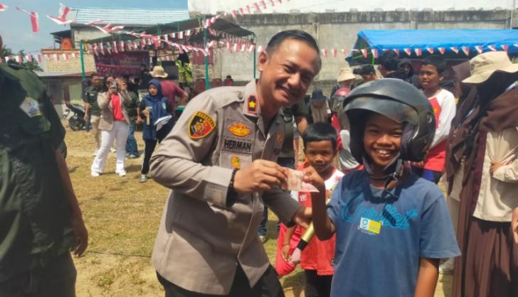 Seru Banget, Kapolsek Kandis Meriahkan HUT RI Ke-80 Bersama Pemuda Sakai, Banyak Ragam Permainan Tradisional
